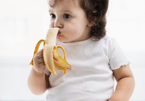 cute-baby-girl-eating-banana (1)